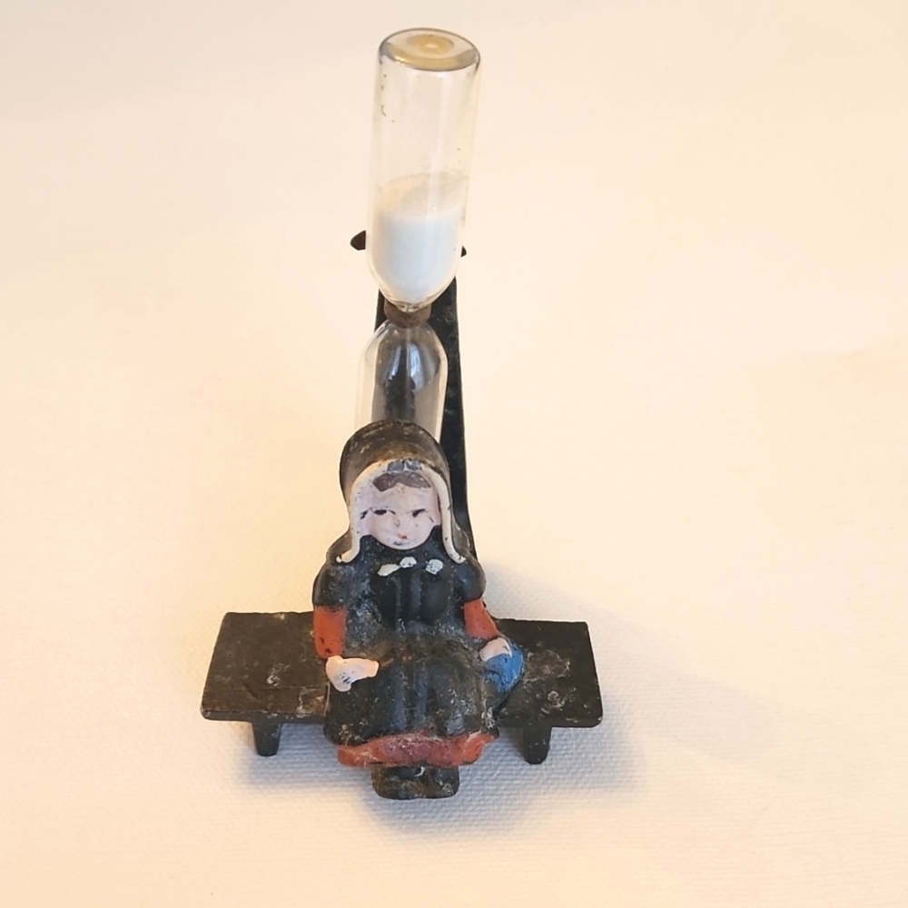 Vintage cast iron egg timer from West Germany